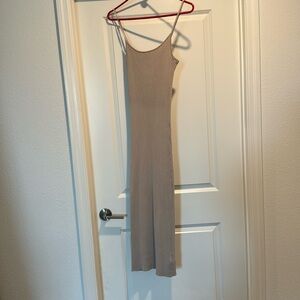 Tan spaghetti strapped sweater dress.